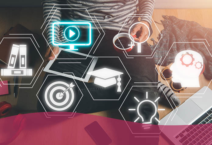 Image of a man working on his tablet surrounded by tech or cybersecurity symbols