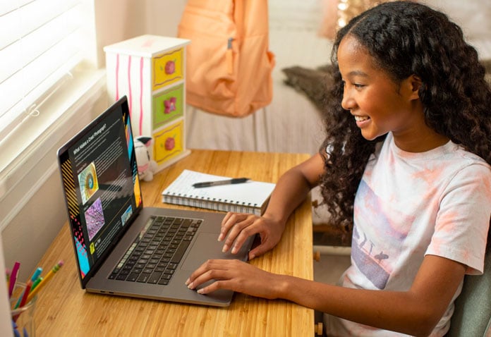 Student using computer at home