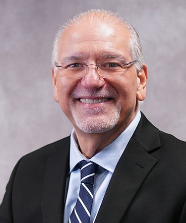 Headshot of Dr. Louis Algaze